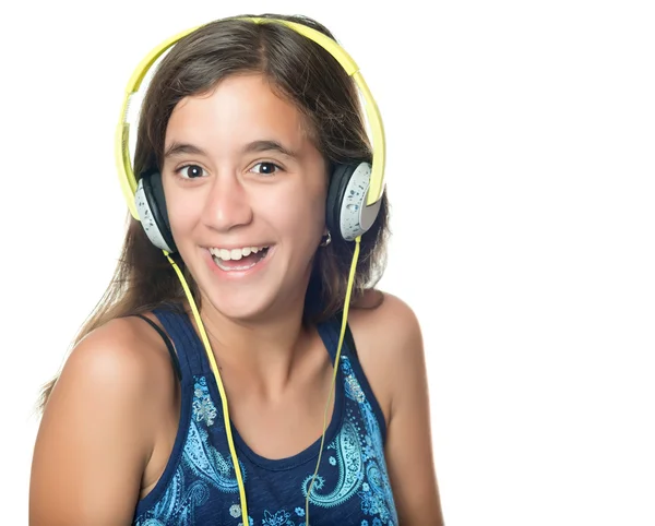 Beautiful hispanic teenager listening to music — Stock Photo, Image