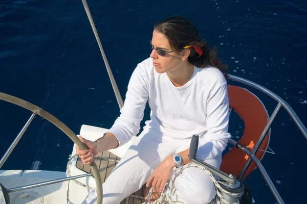 Attractive young Caucasian woman on a sailing yacht on the Adriatic Sea — Stock Photo, Image