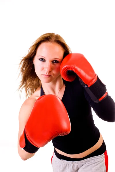 Attractive Caucasian girl practicing boxing, isolated on white background — Stock Photo, Image