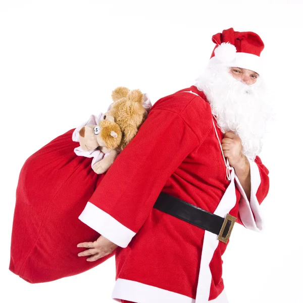 Weihnachtsmann mit Geschenken — Stockfoto