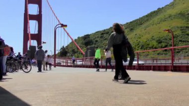 San Francisco, California, USA - April 2017: Unidentified people on the Golden Gate Bridge, 4K footage