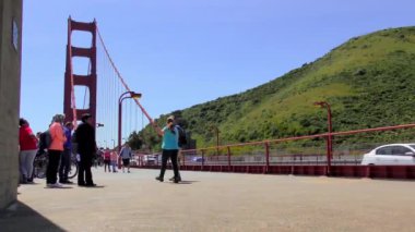 San Francisco, California, USA - April 2017: Unidentified people on the Golden Gate Bridge, 4K footage