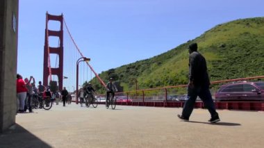 San Francisco, California, USA - April 2017: Unidentified people on the Golden Gate Bridge, 4K footage