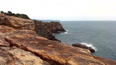 Sandanbeki Cliffs, Shirahama, Wakayama Prefecture, Japan. Sandanbeki consists of three steep cliffs with a large network of caves at water level.