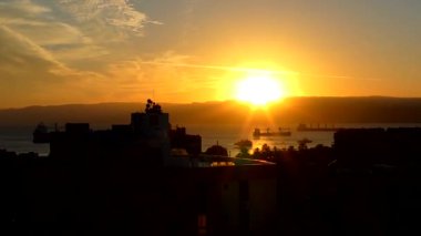 Sunset over the Gulf of Aqaba (part of the Red Sea) at Aqaba, Jordan