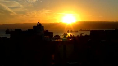 Sunset over the Gulf of Aqaba (part of the Red Sea) at Aqaba, Jordan