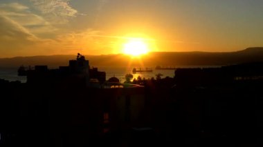 Sunset over the Gulf of Aqaba (part of the Red Sea) at Aqaba, Jordan