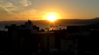 Sunset over the Gulf of Aqaba (part of the Red Sea) at Aqaba, Jordan