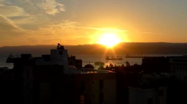 Sunset over the Gulf of Aqaba (part of the Red Sea) at Aqaba, Jordan