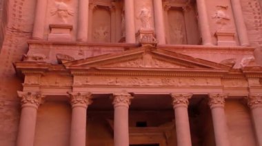 PETRA, JORDAN CIRCA 2016 - Low angle view of the facade of the Treasury building in the ancient Nabatean ruins of Petra, Jordan.