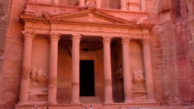 PETRA, JORDAN CIRCA 2016 - Low angle view of the facade of the Treasury building in the ancient Nabatean ruins of Petra, Jordan.
