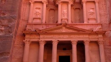PETRA, JORDAN CIRCA 2016 - Low angle view of the facade of the Treasury building in the ancient Nabatean ruins of Petra, Jordan.