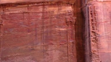 PETRA, JORDAN CIRCA 2016 - Low angle view of the facade of the Treasury building in the ancient Nabatean ruins of Petra, Jordan.