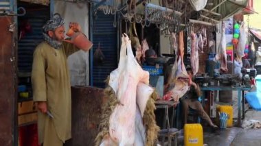 Unidentified people at a market in Kabul, the capital of Afghanistan, circa May 2019