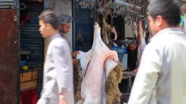 Unidentified people at a market in Kabul, the capital of Afghanistan, circa May 2019
