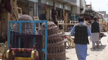Unidentified people at a market in Kabul, the capital of Afghanistan, circa May 2019