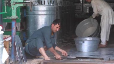 Unidentified people at a market in Kabul, the capital of Afghanistan, circa May 2019
