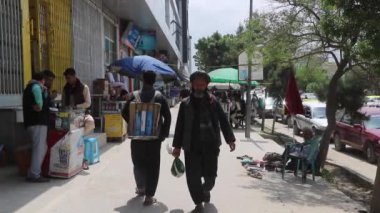 Unidentified people in Kabul, the capital of Afghanistan, circa May 2019