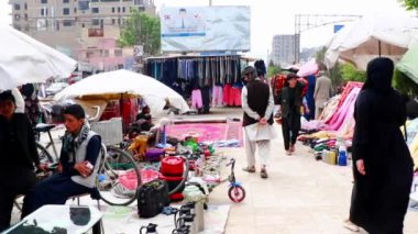 Unidentified people at a market in Kabul, the capital of Afghanistan, circa May 2019