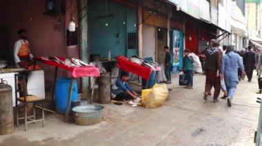 Unidentified people at a market in Kabul, the capital of Afghanistan, circa May 2019