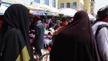 Unidentified people at a market in Kabul, the capital of Afghanistan, circa May 2019
