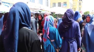 Unidentified people at a market in Kabul, the capital of Afghanistan, circa May 2019