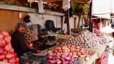 Unidentified people at a market in Kabul, the capital of Afghanistan, circa May 2019
