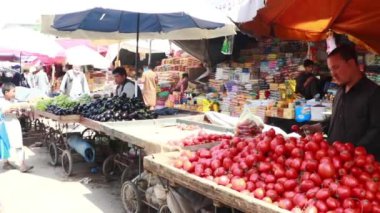 Unidentified people at a market in Kabul, the capital of Afghanistan, circa May 2019
