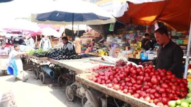 Unidentified people at a market in Kabul, the capital of Afghanistan, circa May 2019