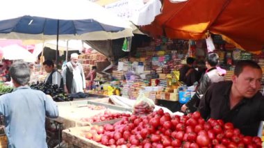 Unidentified people at a market in Kabul, the capital of Afghanistan, circa May 2019