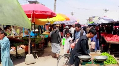 Unidentified people at a market in Kabul, the capital of Afghanistan, circa May 2019