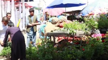 Unidentified people at a market in Kabul, the capital of Afghanistan, circa May 2019
