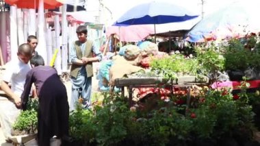 Unidentified people at a market in Kabul, the capital of Afghanistan, circa May 2019