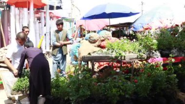 Unidentified people at a market in Kabul, the capital of Afghanistan, circa May 2019