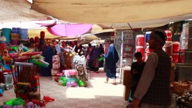 Unidentified people at a market in Kabul, the capital of Afghanistan, circa May 2019