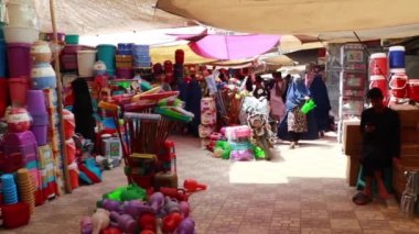 Unidentified people at a market in Kabul, the capital of Afghanistan, circa May 2019