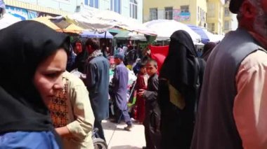 Unidentified people at a market in Kabul, the capital of Afghanistan, circa May 2019