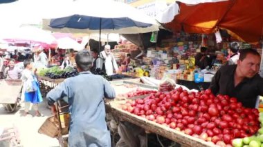 Unidentified people at a market in Kabul, the capital of Afghanistan, circa May 2019