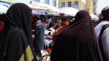 Unidentified people at a market in Kabul, the capital of Afghanistan, circa May 2019