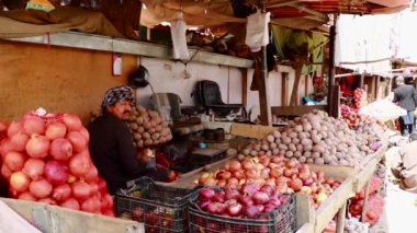 Unidentified people at a market in Kabul, the capital of Afghanistan, circa May 2019