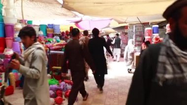 Unidentified people at a market in Kabul, the capital of Afghanistan, circa May 2019