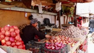 Unidentified people at a market in Kabul, the capital of Afghanistan, circa May 2019