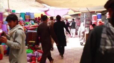 Unidentified people at a market in Kabul, the capital of Afghanistan, circa May 2019