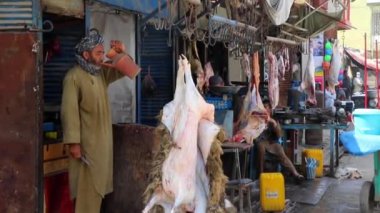 Unidentified people at a market in Kabul, the capital of Afghanistan, circa May 2019