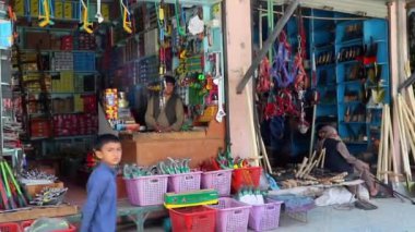 Unidentified people at a market in Kabul, the capital of Afghanistan, circa May 2019