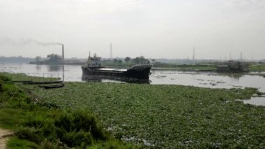 The Buriganga River in the Southwest outskirts of Dhaka, the capital of Bangladesh, circa March 2020