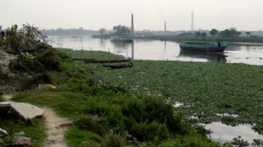 The Buriganga River in the Southwest outskirts of Dhaka, the capital of Bangladesh, circa March 2020