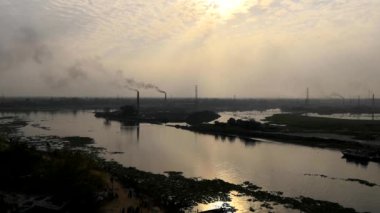 Sunset over the Buriganga River in the Southwest outskirts of Dhaka, the capital of Bangladesh
