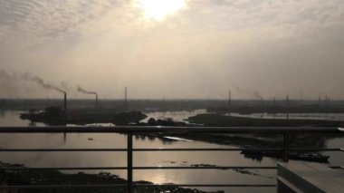 Sunset over the Buriganga River in the Southwest outskirts of Dhaka, the capital of Bangladesh