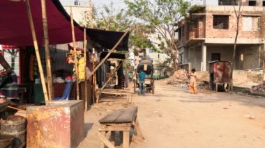 Unidentified people working at a construction site at the Chandrima Housing Society in Dhaka, the capital of Bangladesh, circa March 2020